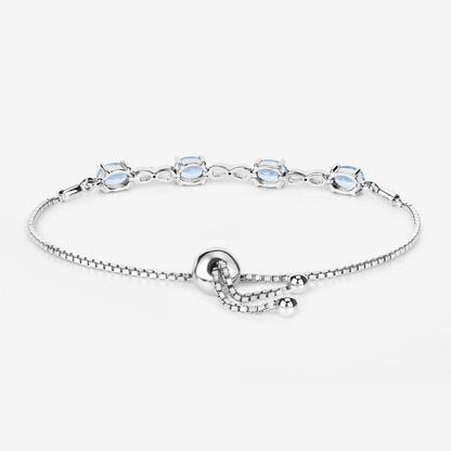 Oval Blue Aquamarine Prong Two-Tone Gold Plated Silver Infinity Bolo Adjustable Bracelet