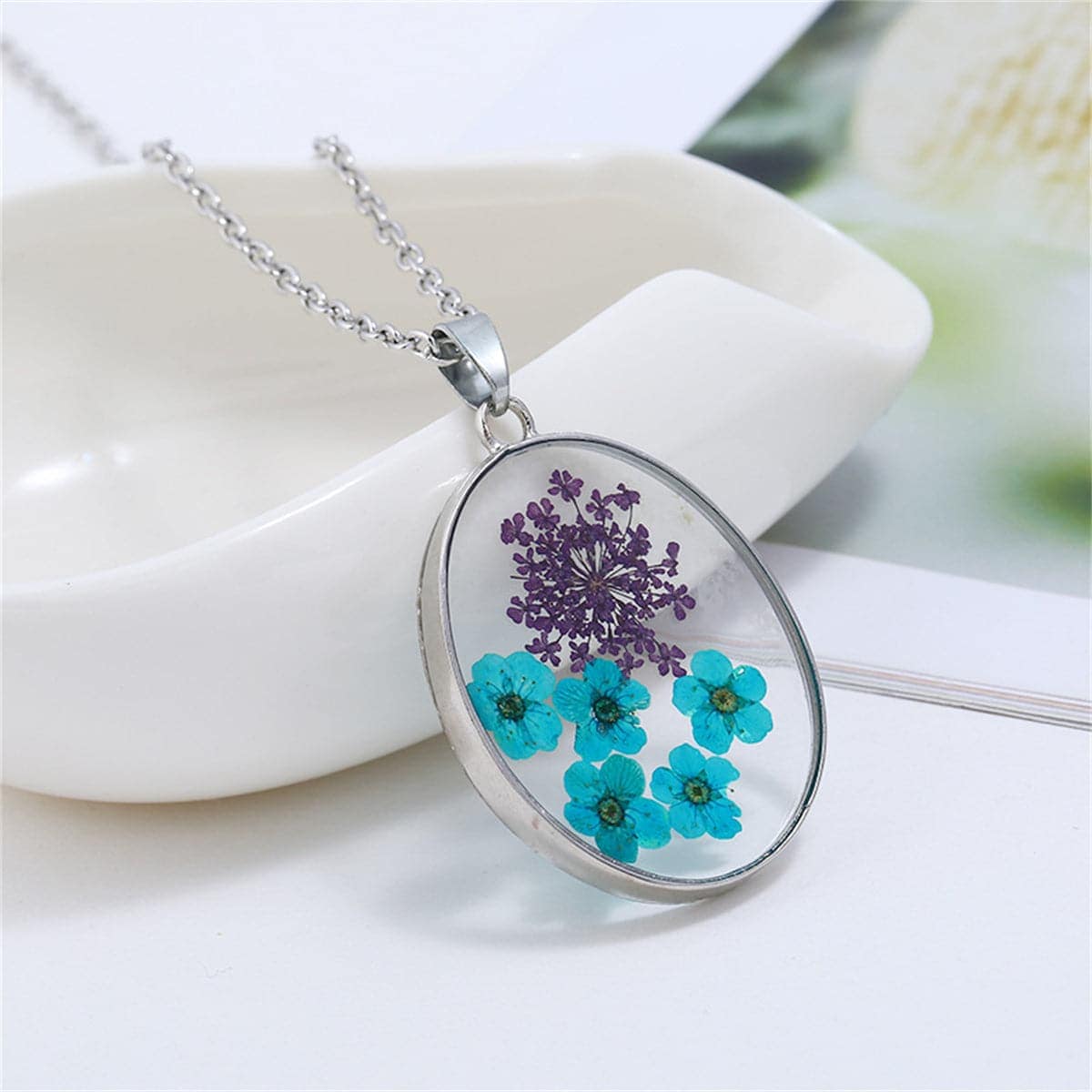 Blue Pressed Peach Blossom & Silvertone Oval Pendant Necklace