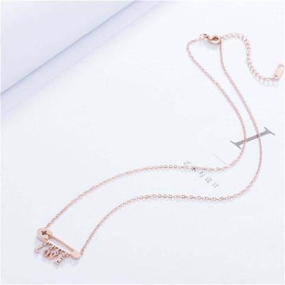 Rose Goldtone 'Love' Safety Pin Pendant Necklace