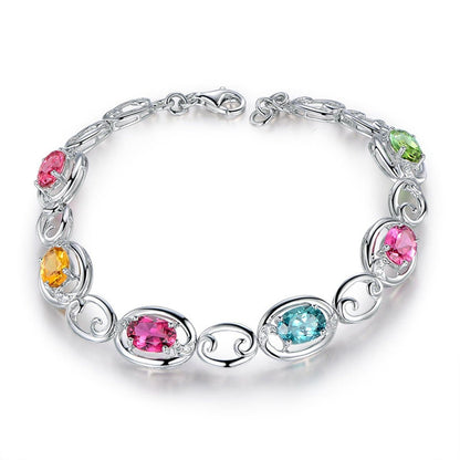 Pink Oval Crystal & Silvertone Station Bracelet