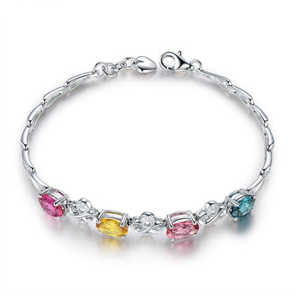 Blue Crystal & Silvertone Clover Charm Bracelet