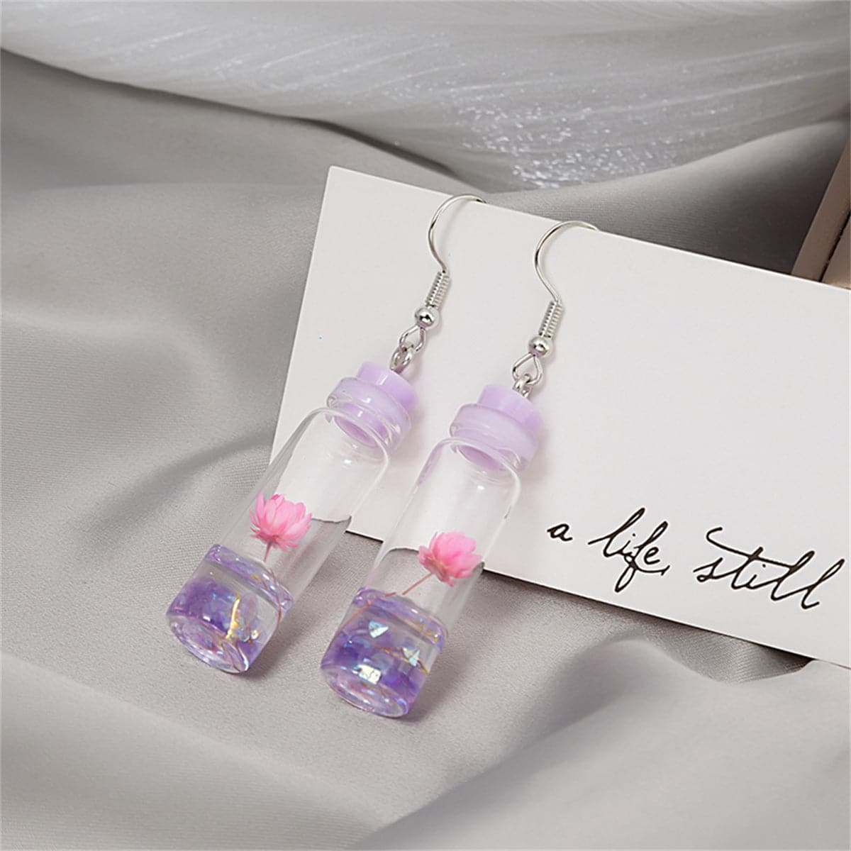 Purple Flower & Silvertone Drift Bottle Drop Earrings