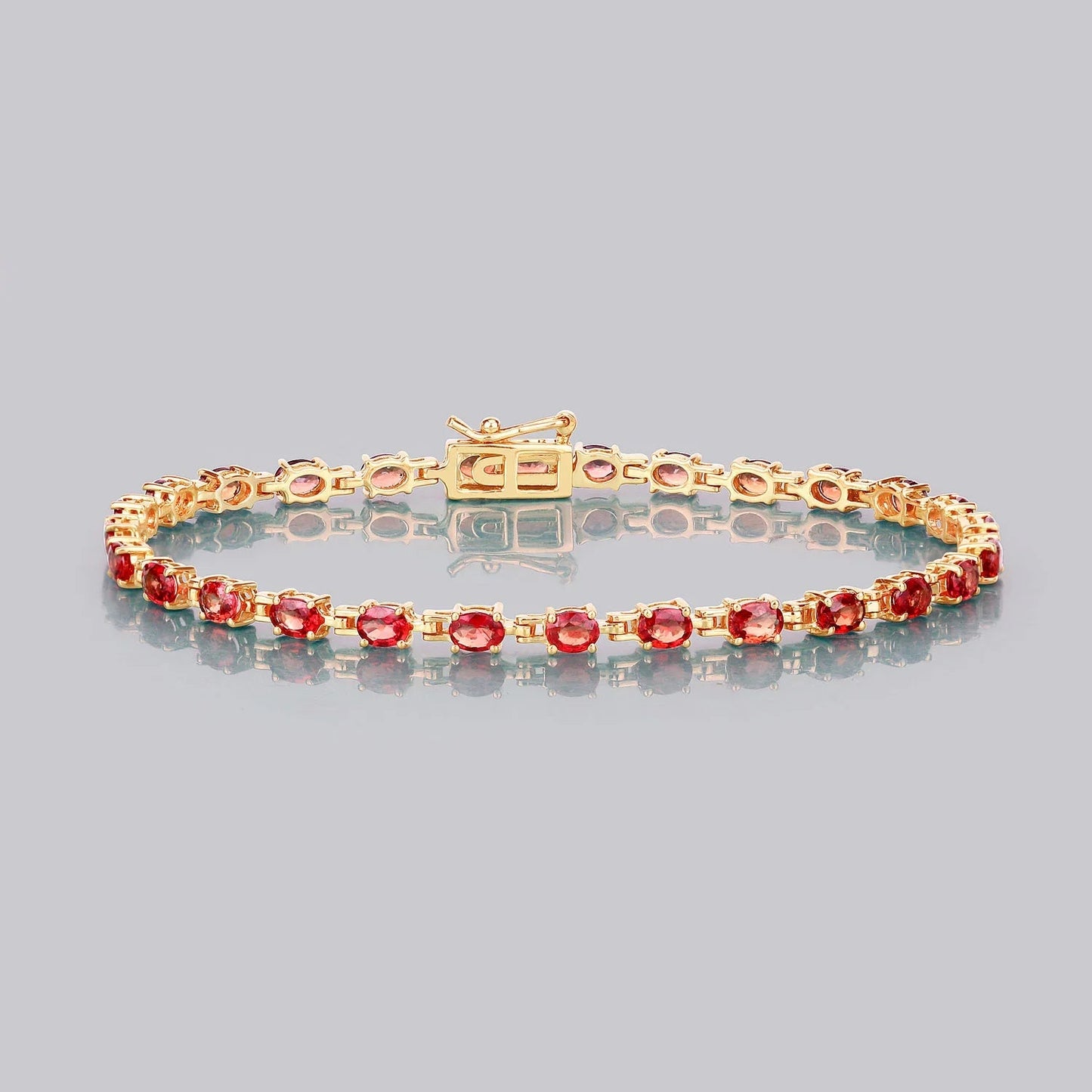 7.00 Ct Oval Orange Sapphire Prong 14K Yellow Gold Inline Tennis Bracelet
