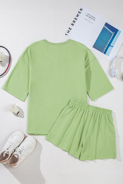 Meadow Mist Green Solid Loose V Neck Half Sleeve Tee and Shorts