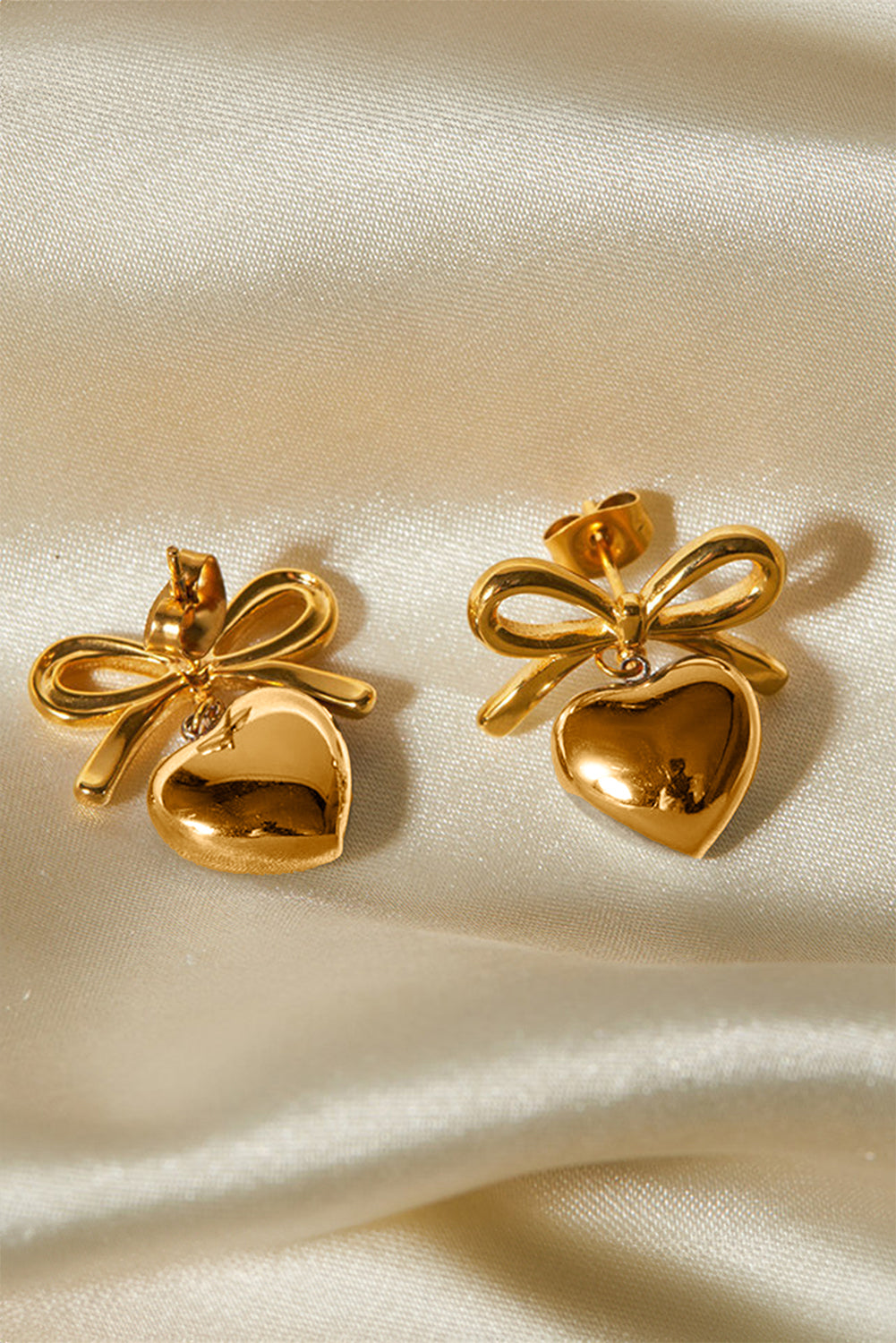 Threaded Pear Gold Heart and Bow Studded Earrings