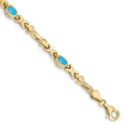 Oval Swiss Blue Topaz Bezel 10K Yellow Gold Fancy Link Bracelet
