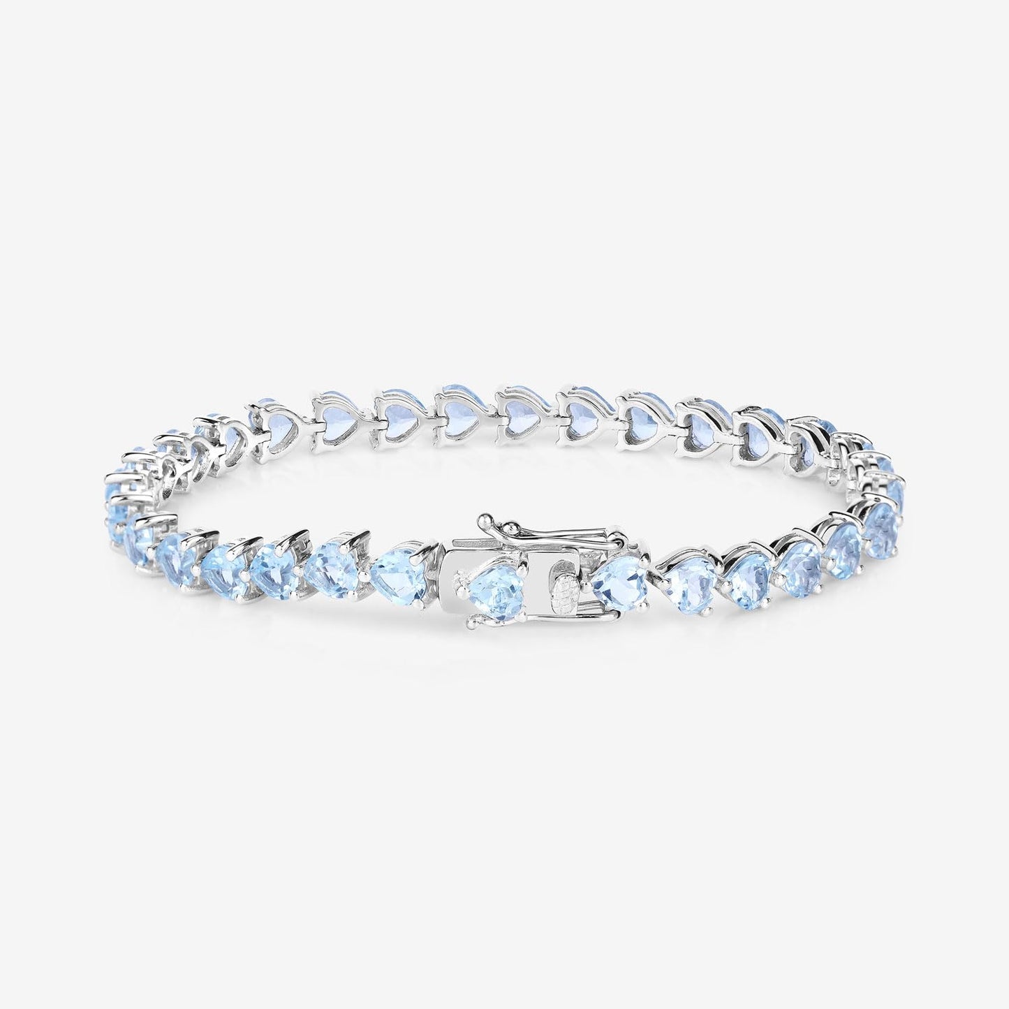 Heart Sky Blue Topaz Prong Silver Tennis Bracelet