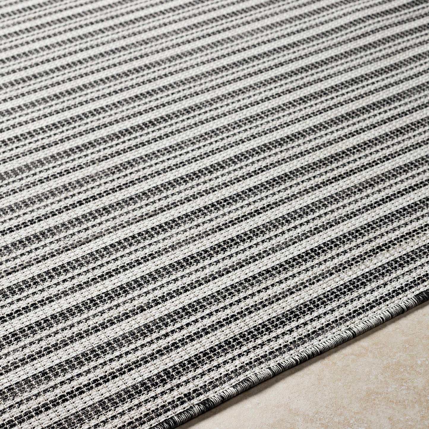Greg Black Outdoor Area Rug - Clearance