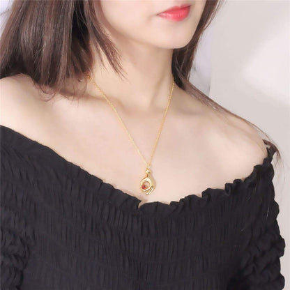 Red Crystal & Goldtone Heart Palm Pendant Necklace