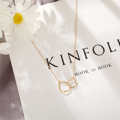 Goldtone Geometric Pendant Necklace