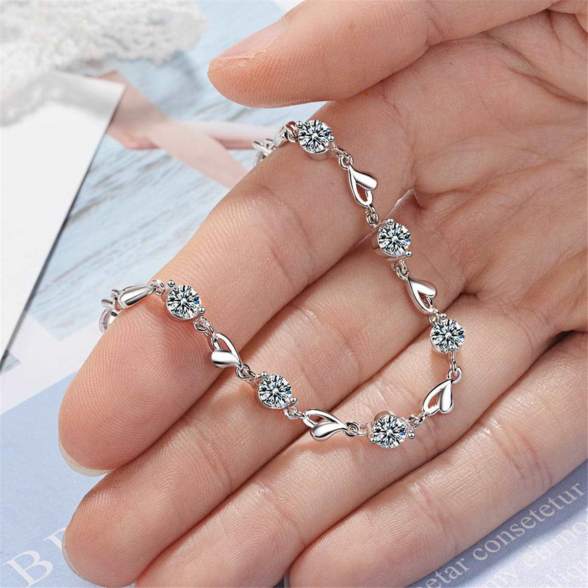 Cubic Zirconia & Silvertone Heart Station Bracelet