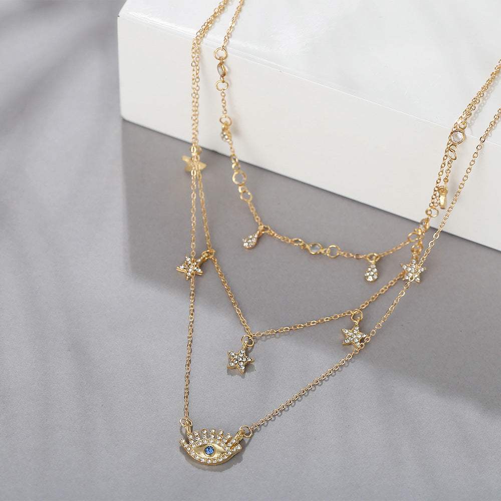 Cubic Zirconia & Goldtone Star & Eye Layered Necklace