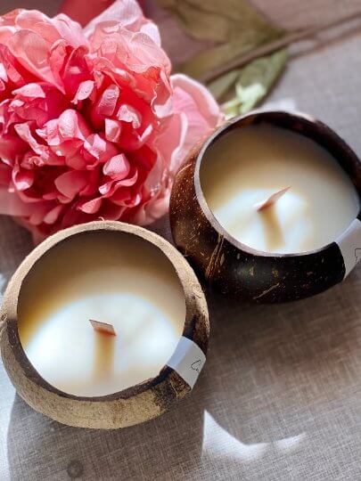 Tropical-style candle in coconut shell