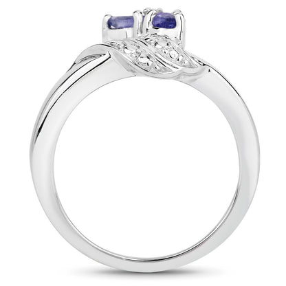 0.42 Cttw Pear Violet Tanzanite Rhodium over Silver Three Stone Bypass Ring