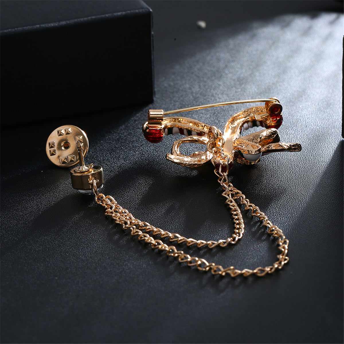 Cubic Zirconia & Enamel Goldtone Candy Cane Layered Chain Brooch