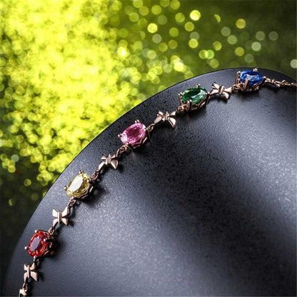 Green Crystal & Rose Goldtone Butterfly Charm Bracelet