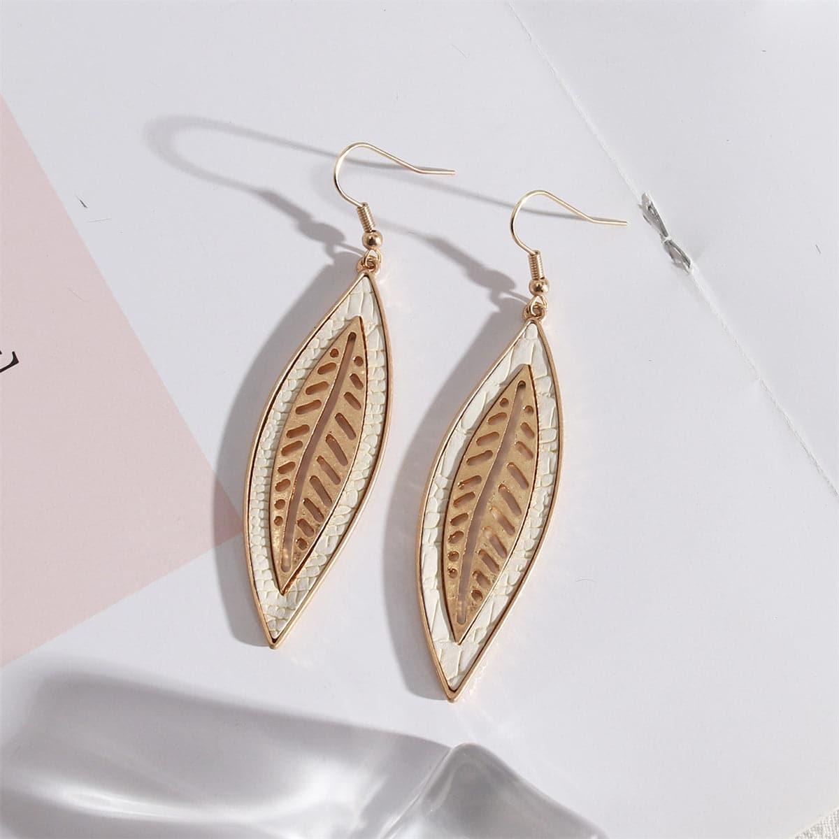 White Polyurethane & Goldtone Weave Leaf Drop Earrings