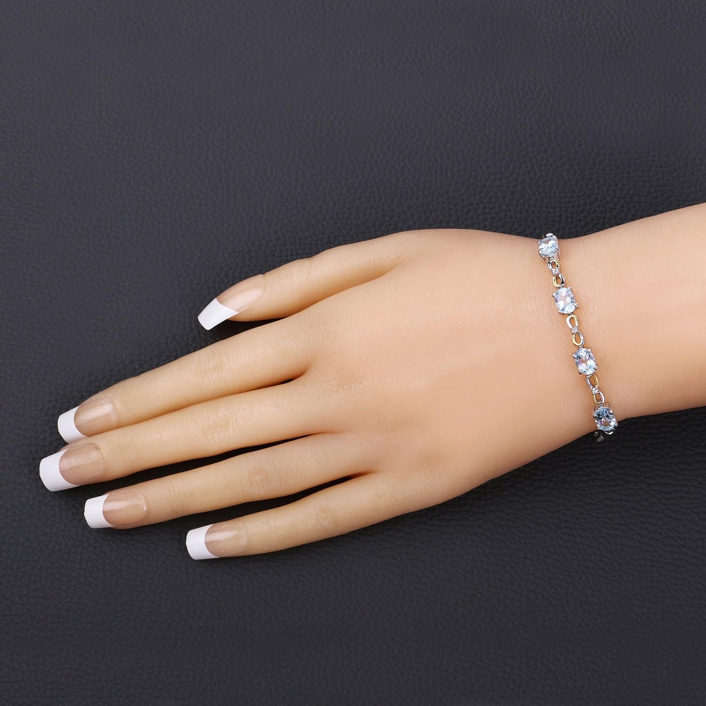 Oval Blue Topaz Prong Silver Infinity Bolo Adjustable Bracelet