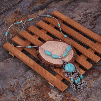 Turquoise & Silvertone Tassel Pendant Necklace
