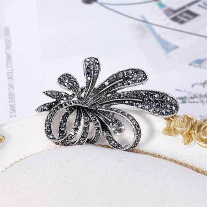 Black Cubic Zirconia & Silvertone Flower Brooch