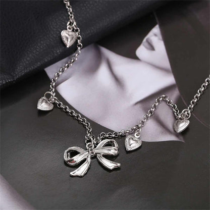 Silvertone Bow Heart Station Necklace