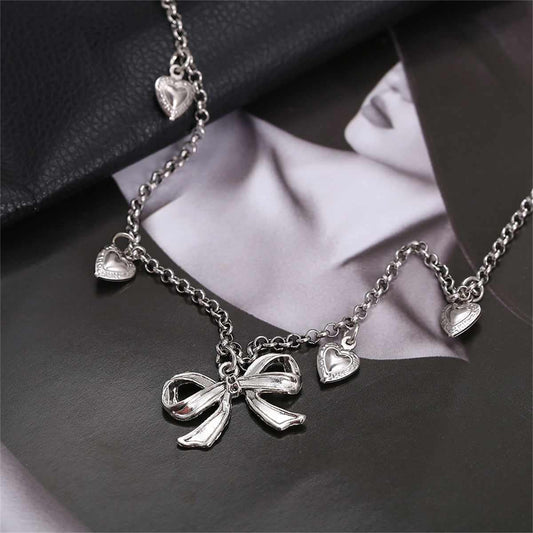 Silvertone Bow Heart Station Necklace