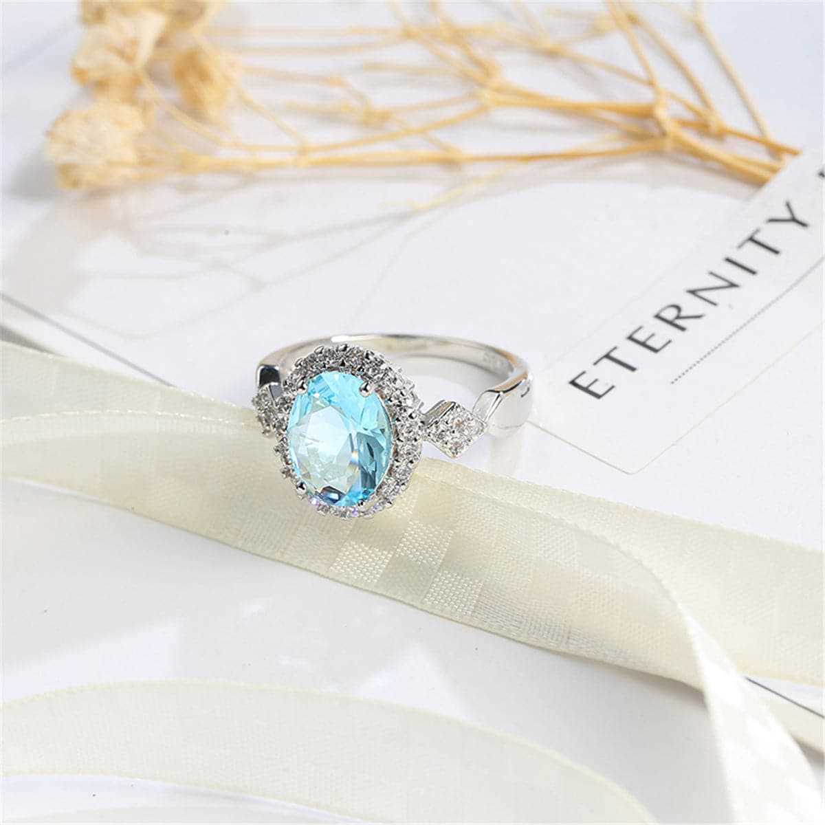 Sea Blue Cubic Zirconia & Crystal Halo Oval Ring