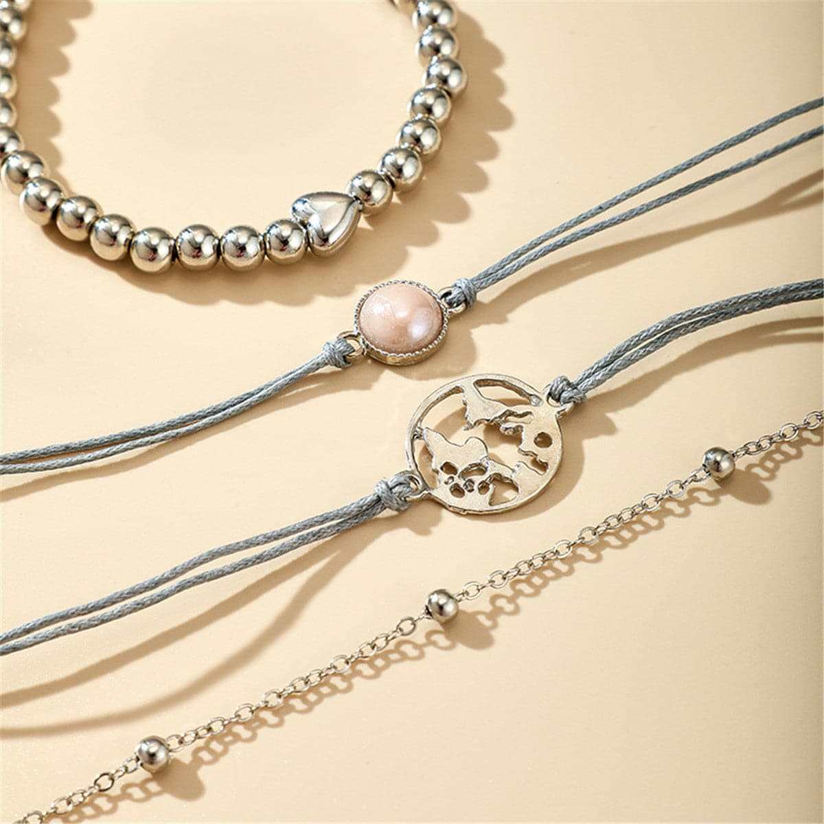 Silvertone Globe Charm Bracelet Set