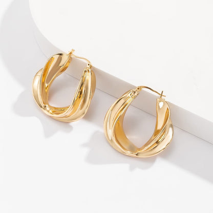 Goldtone Twist Huggie Earrings
