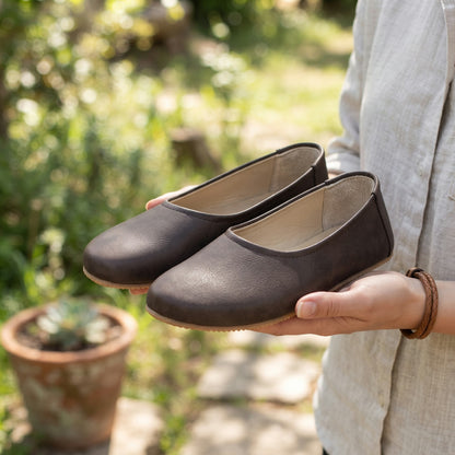 Dark brown-