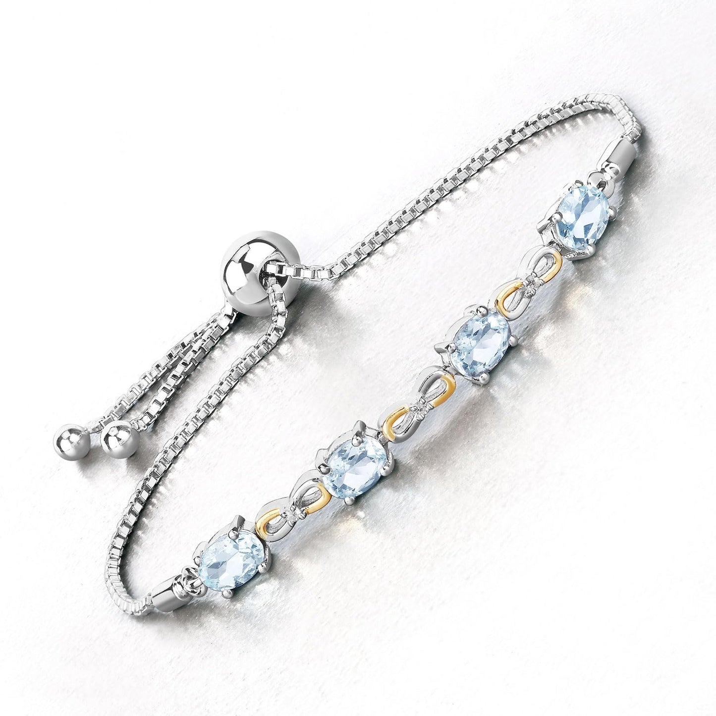 Oval Blue Aquamarine Prong Two-Tone Gold Plated Silver Infinity Bolo Adjustable Bracelet
