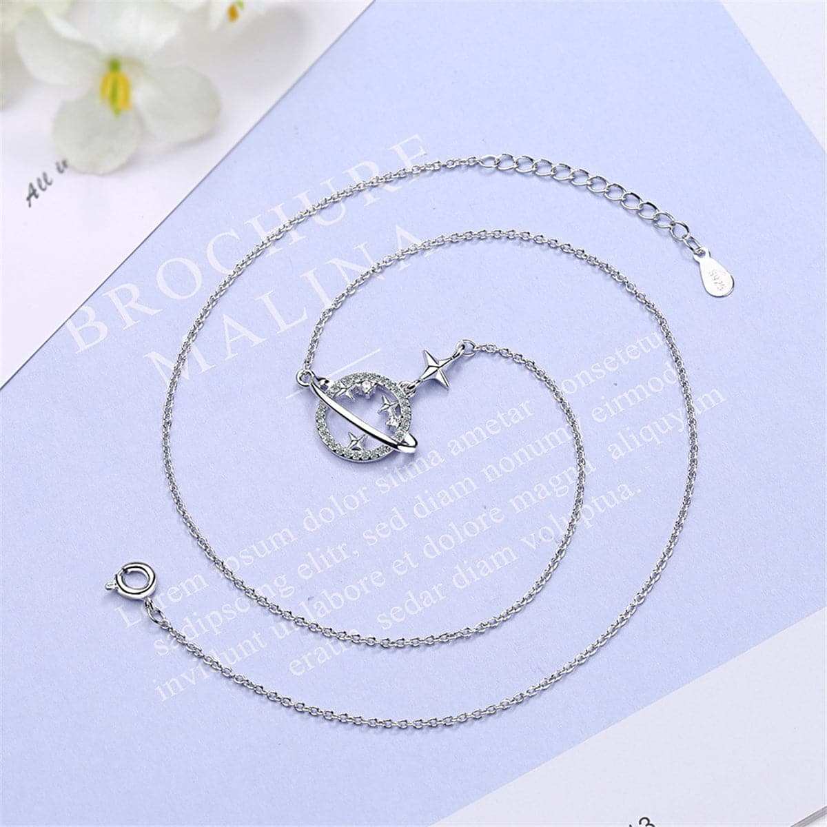Cubic Zirconia & Silvertone Planet Pendant Necklace