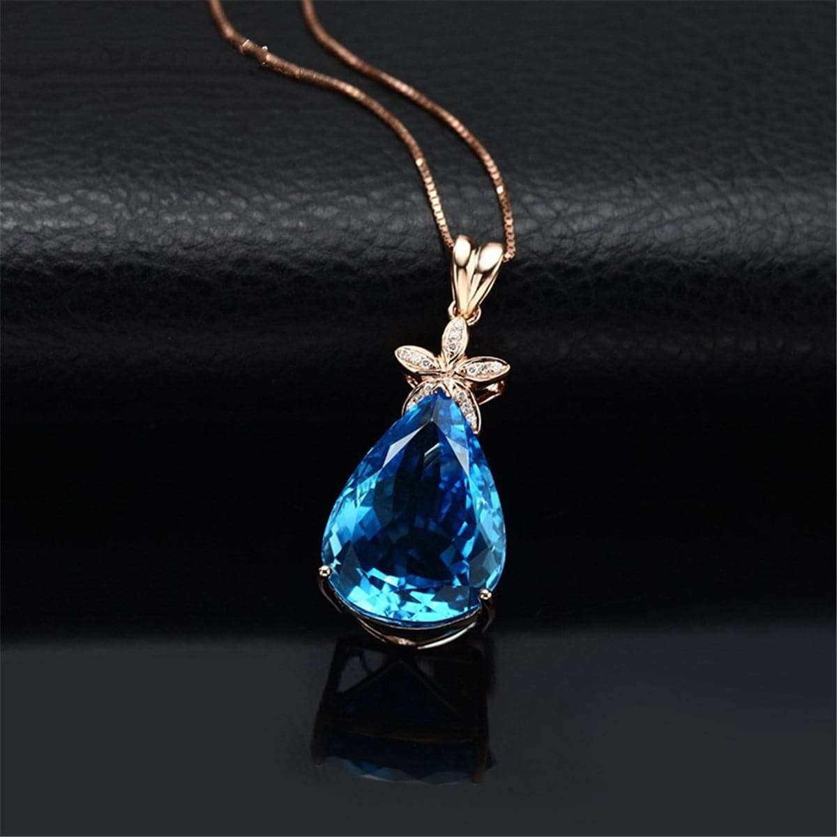 Blue Crystal & Cubic Zirconia Pear Cut Flower Pendant Necklace