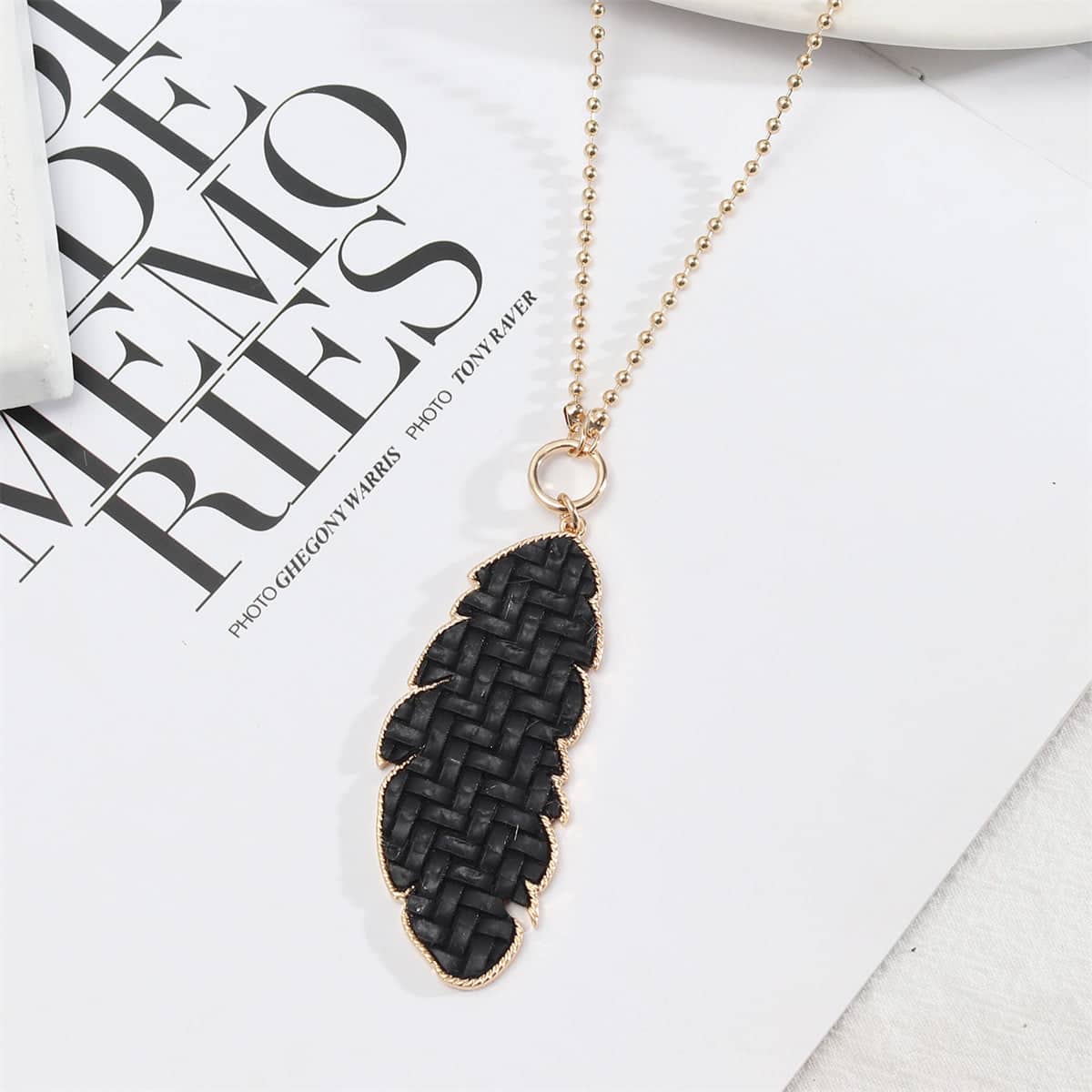 Black Polyurethane & Goldtone Weave Leaf Pendant Necklace