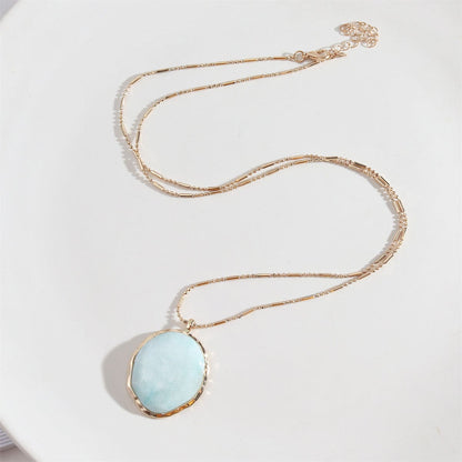 Light Blue Turquoise & Goldtone Oval Pendant Necklace