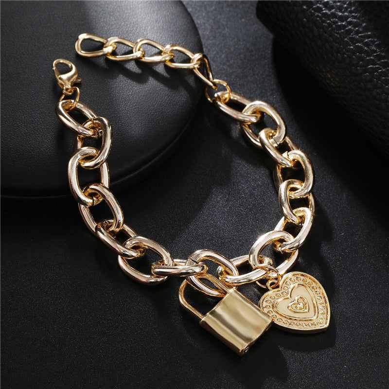 Goldtone Heart & Lock Link Charm Bracelet