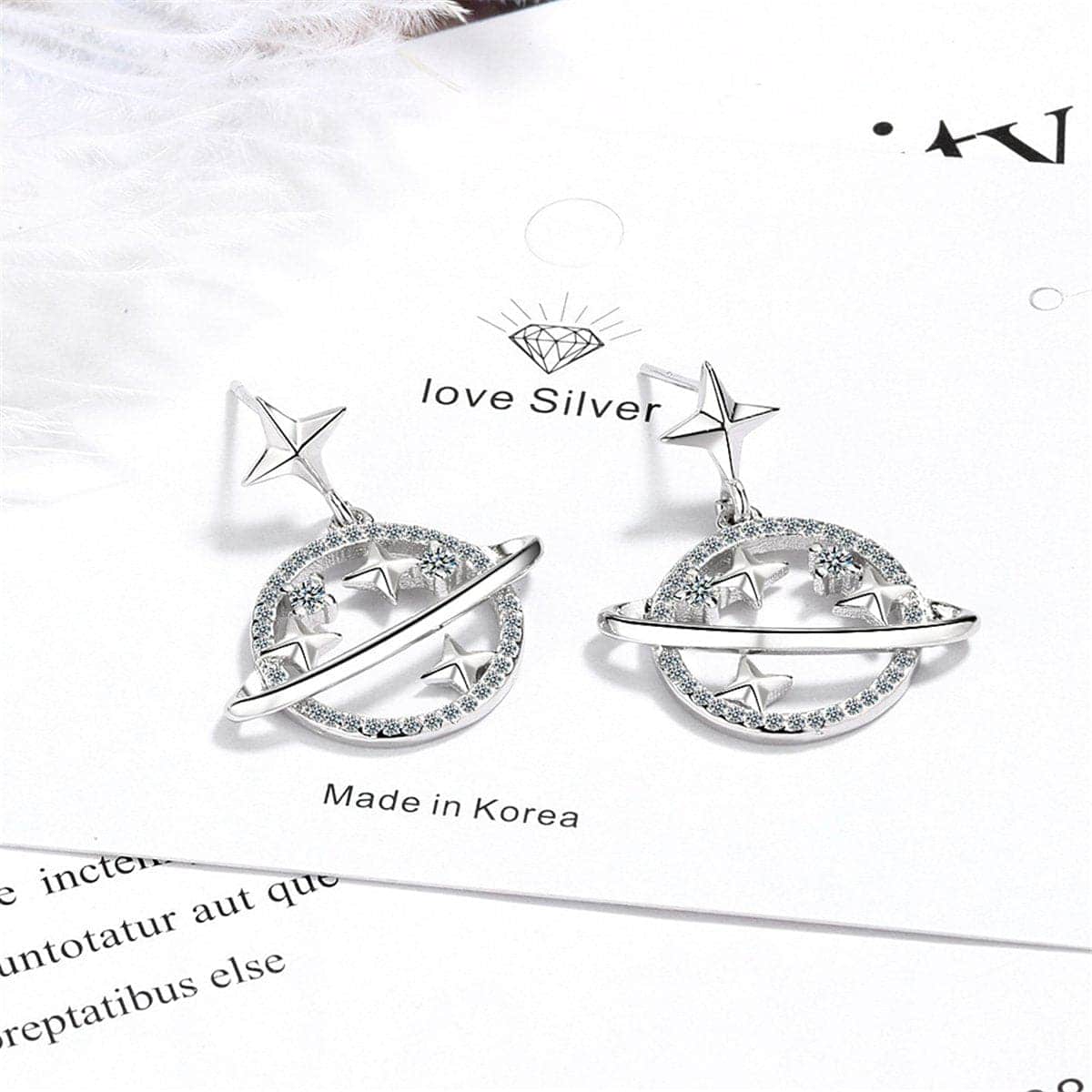 Cubic Zirconia & Silvertone Planet Drop Earrings