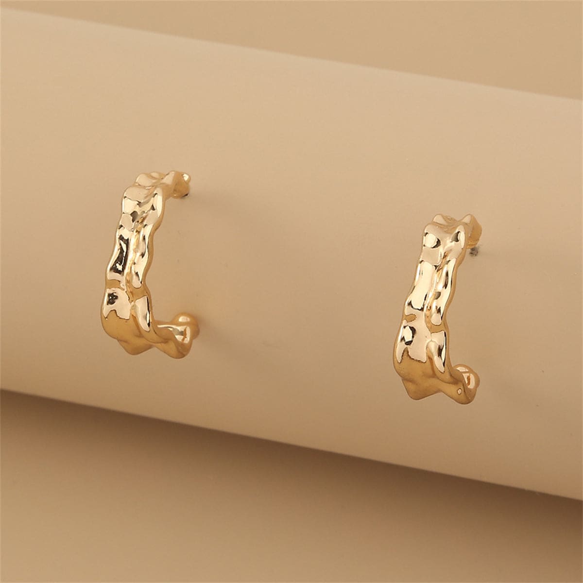 Goldtone Leaf Huggie Earrings