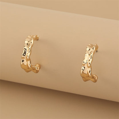 Goldtone Leaf Huggie Earrings