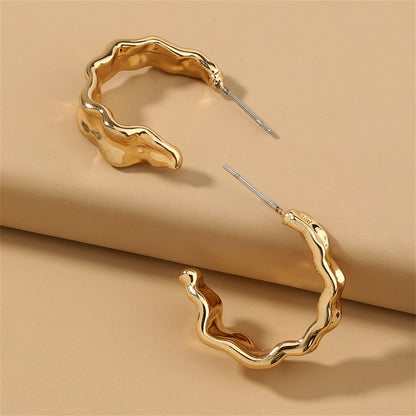 Goldtone Leaf Huggie Earrings