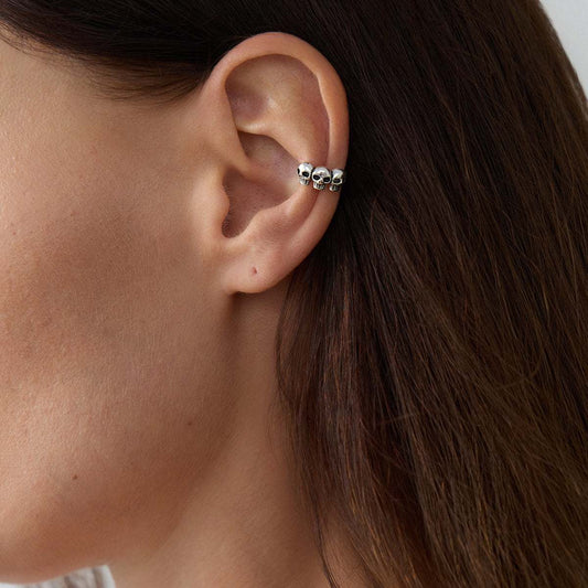 Silvertone Three-Skulls Ear Cuff