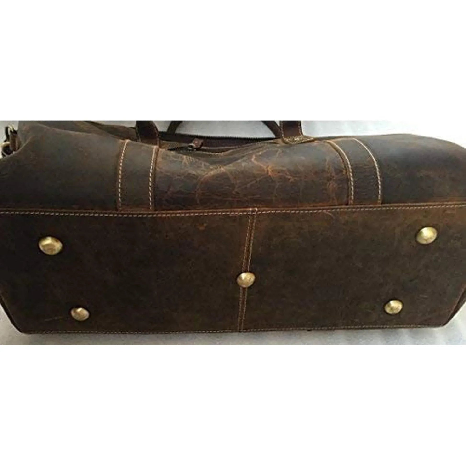 Men's vintage brown distressed leather duffle bag with brass feet by FR Fashion Co.