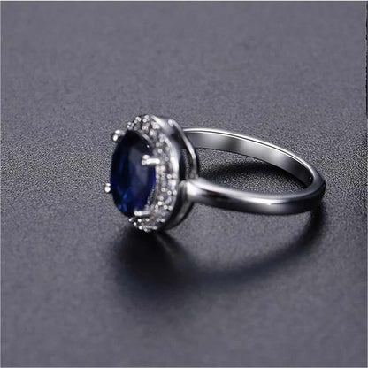 Blue Crystal & Cubic Zirconia Silvertone Halo Oval Ring-1