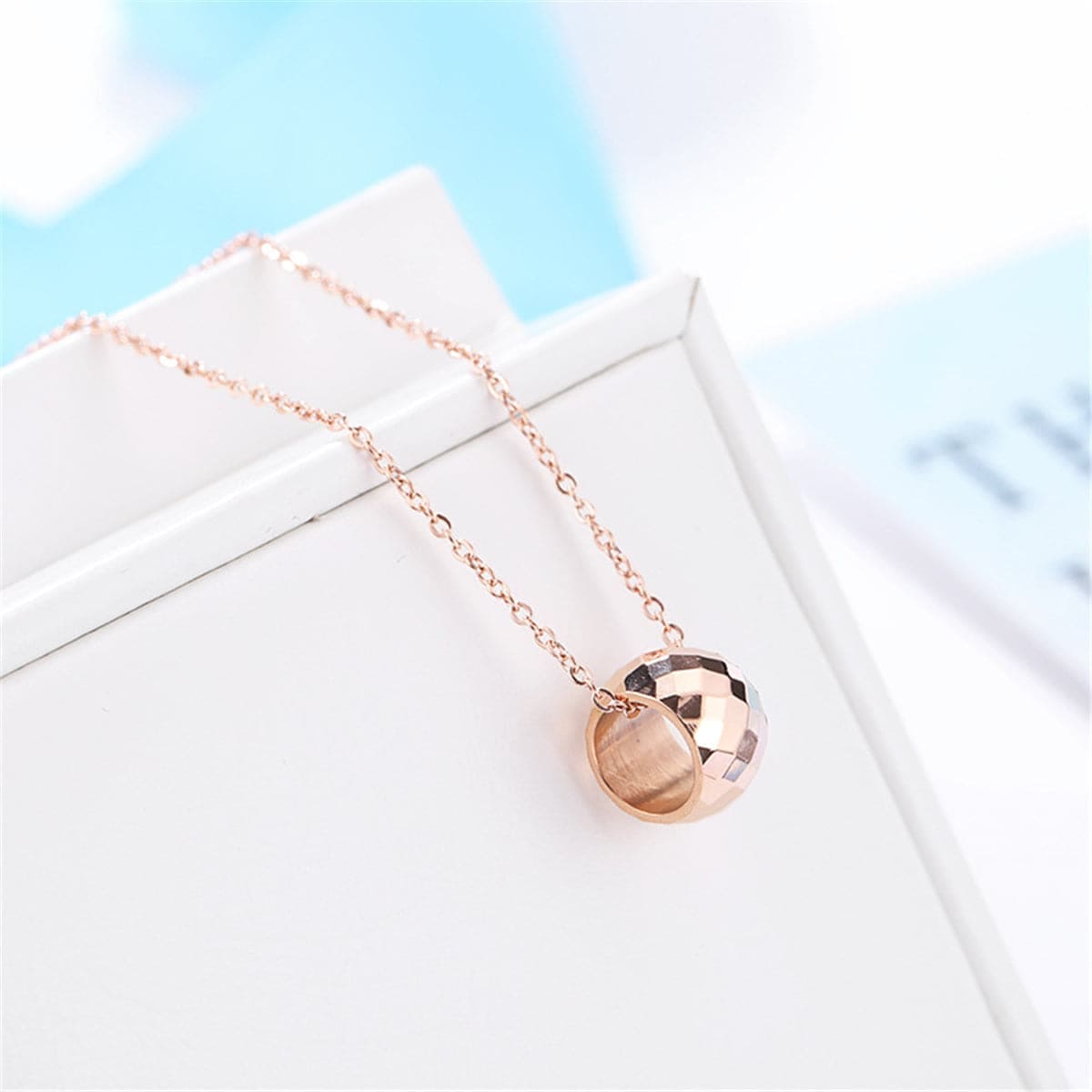 Rose Goldtone Cut Ball Pendant Necklace