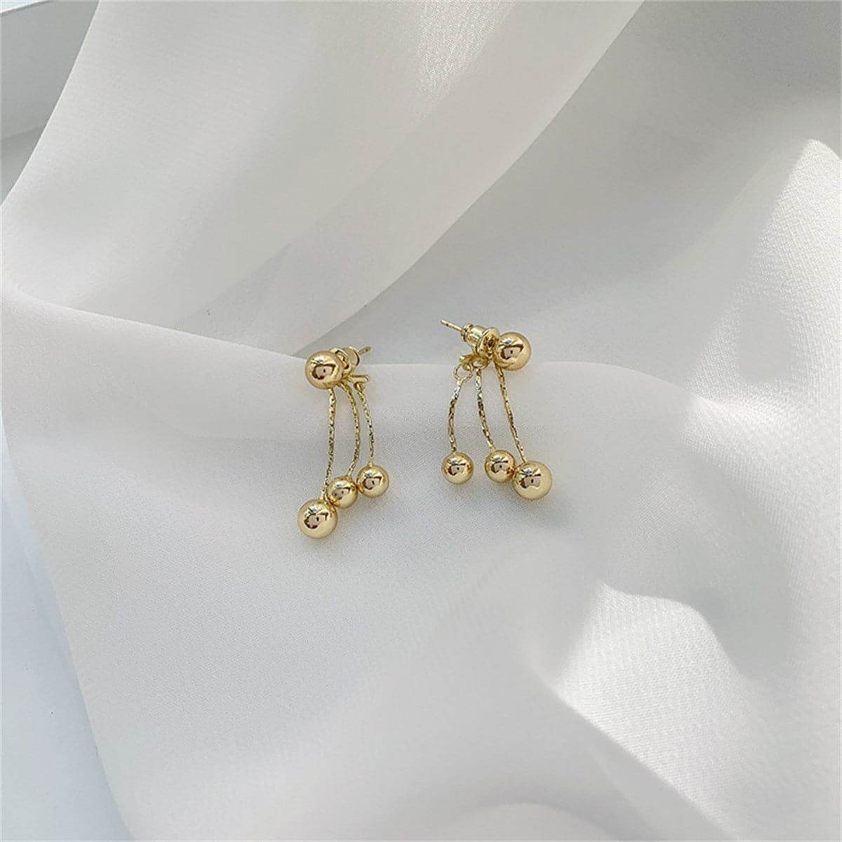 Goldtone Waterfall Ball Tassel Ear Jackets