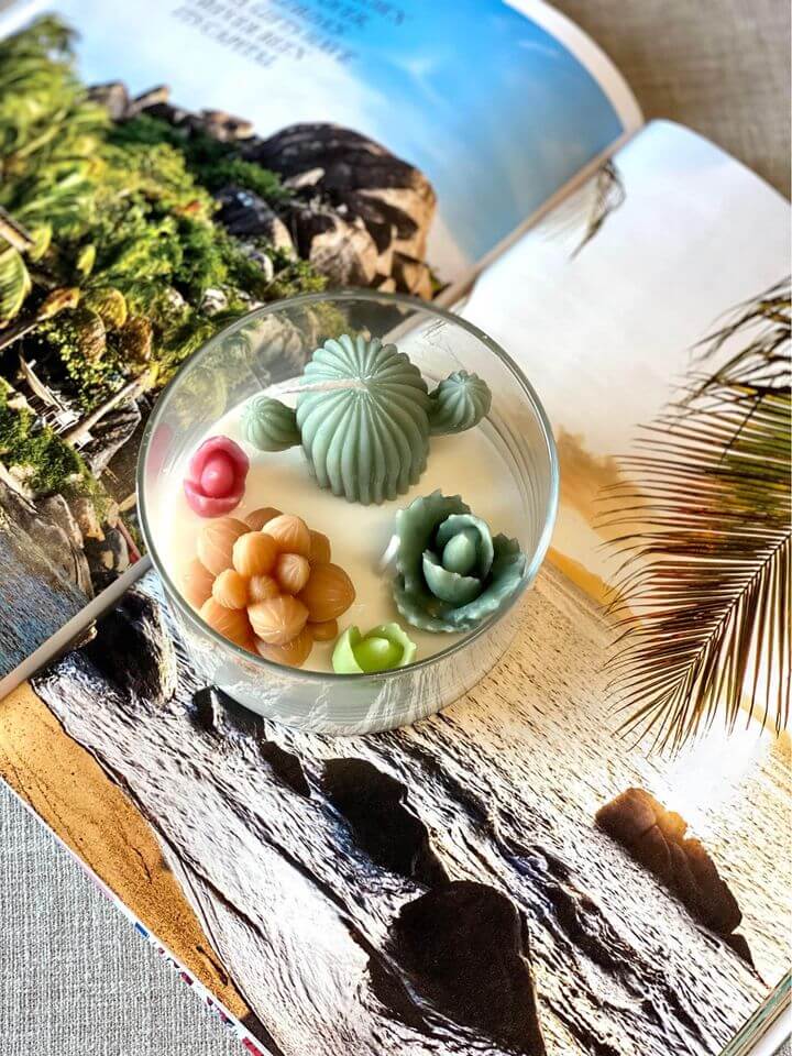 Scented candle with garden terrarium design