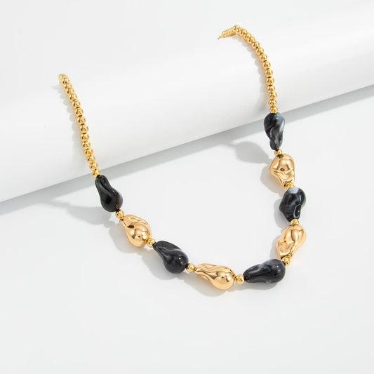 Black Resin & Goldtone Irregular Drop Station Collar Necklace