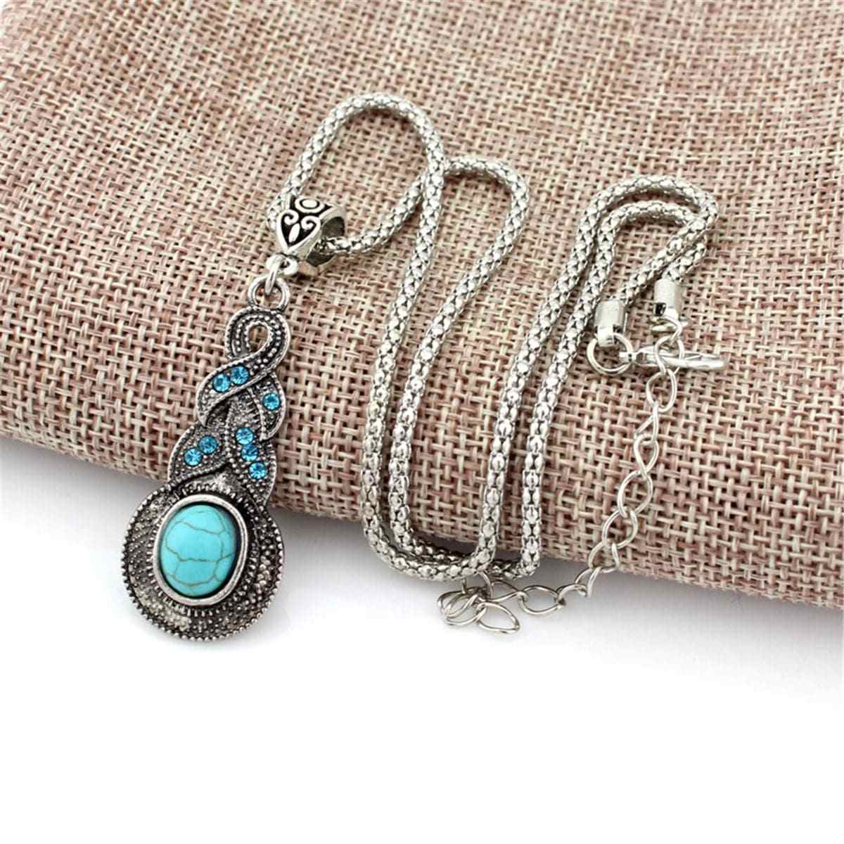 Turquoise & Cubic Zirconia Silvertone Braided Pendant Necklace