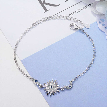 Blue Crystal & Silvertone Star & Moon Bracelet