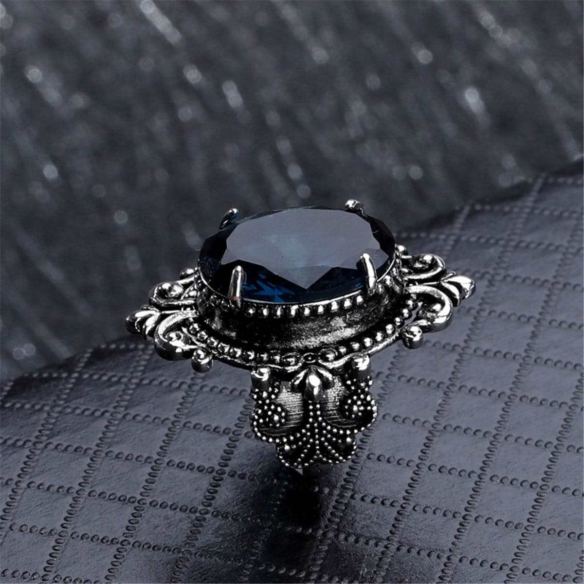 Blue Crystal & Silvertone Oval Filigree Ring